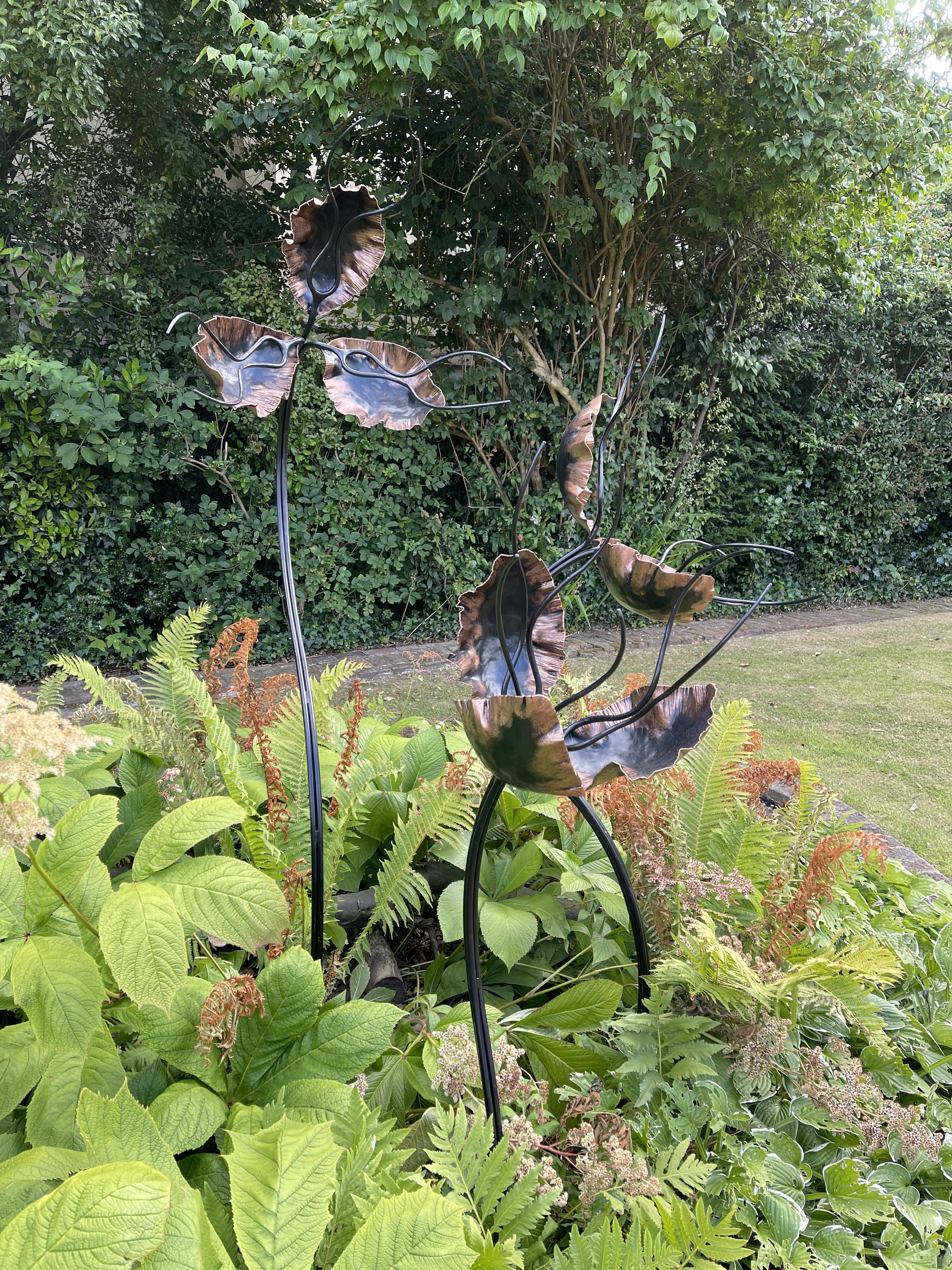 Metal flower garden sculpture by Helen Roberts